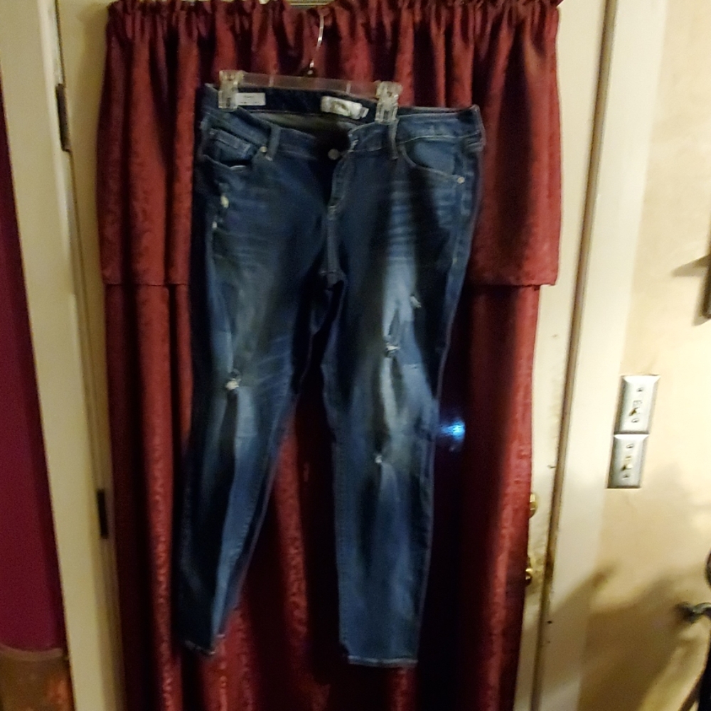 Distressed blue jeans